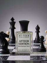 AT-TEEB Edition eau de parfum bottle with black cap; front label 'Gentleman Noir'.