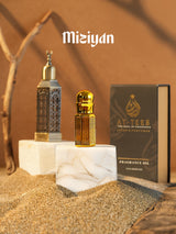 MIZIYAN fragrance oil bottle with ornate dark glass and gold cap, plus box