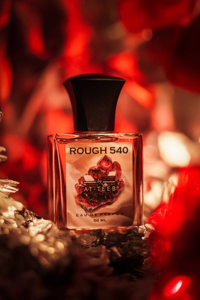 50 ml perfume bottle, clear glass with black cap and label