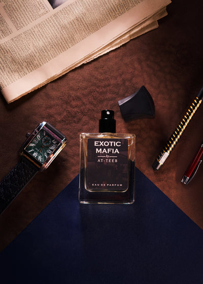 EXOTIC MAFIA Eau de Parfum bottle with black cap, angled view