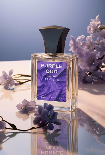 Perfume bottle in clear glass with dark cap and purple label